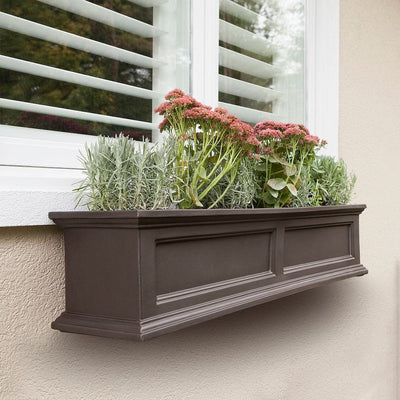 The Mayne Fairfield 4ft Window Box Planter, in the espresso finish, planted and mounted on home for curb appeal