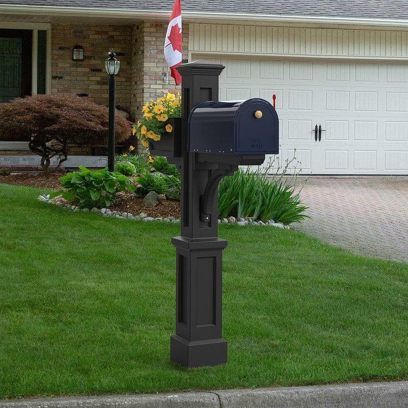 The Mayne Westbrook Plus Mail Post, in the black finish, installed for curb appeal.