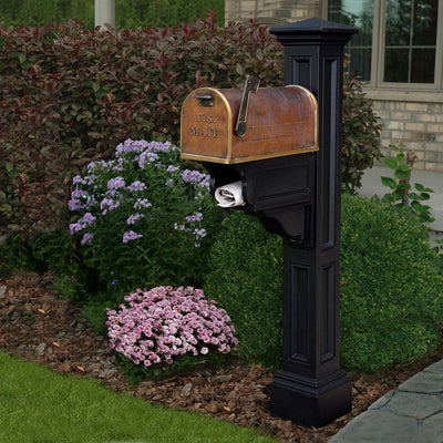 The Mayne Charleston Plus Mail Post, in the black finish, installed for curb appeal.