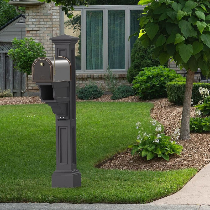 The Mayne Charleston Plus Mail Post, in the graphite finish,installed for curb appeal.