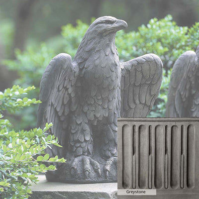 Greystone Patina for the Campania International Eagle Looking Left Statue, a classic gray, soft, and muted, blends nicely in the garden.