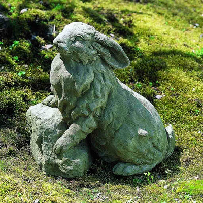 Campania International Rabbit on a Rock Statue stained in the Greystone  patina, the ideal color for this garden statue.
