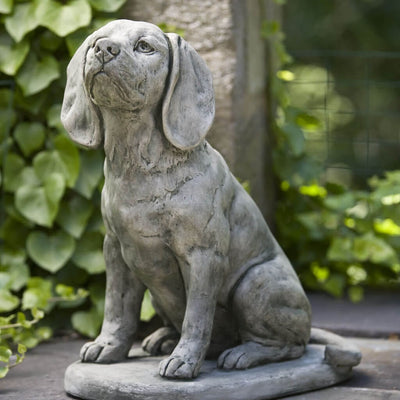 Campania International Scout Dog Statue, is ready for a treat because he is a good dog. Shown in the soft Greystone Patina, Scout is a classic garden statue.