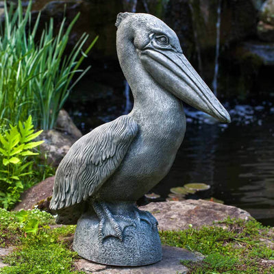 Campania International Pelican Statue stained in the Alpine Stone  patina, the ideal color for this garden statue.