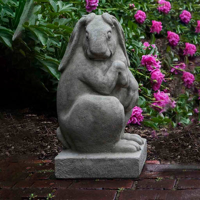 Campania International Newport Rabbit Facing Right Statue stained in the Greystone patina, the ideal color for this garden statue.
