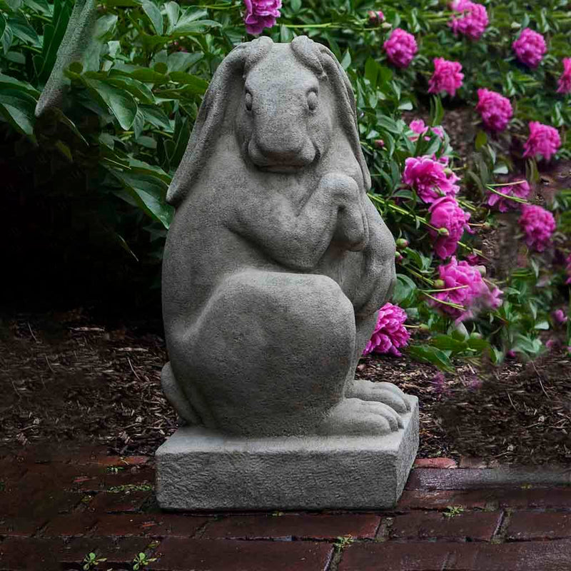 Campania International Newport Rabbit Facing Right Statue stained in the Greystone patina, the ideal color for this garden statue.