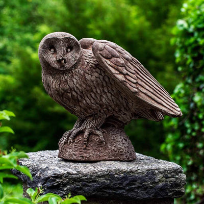 Campania International Barny Statue stained in the Brownstone  patina, the ideal color for this garden statue.