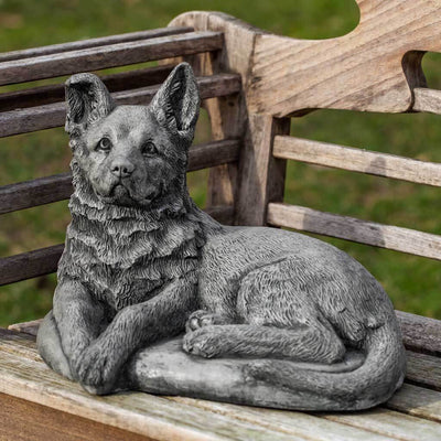 Campania International Shepherd Pup Dog Statue, we love your ears and that sweet expression! Lounging after a long day of caring for the flock, this Sherpard Pup is shown in the Apline Stone Patina.