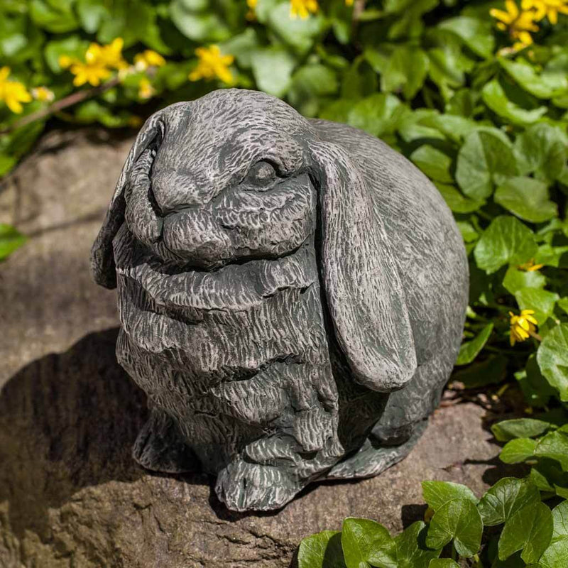 Campania International Butterball Statue, set in the garden to add charm and character. The statue is shown in the Alpine Stone Patina.