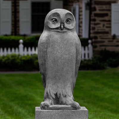 Campania International Dr. Hoo Statue, set in the garden to add charm and character. The statue is shown in the Alpine Stone Patina.