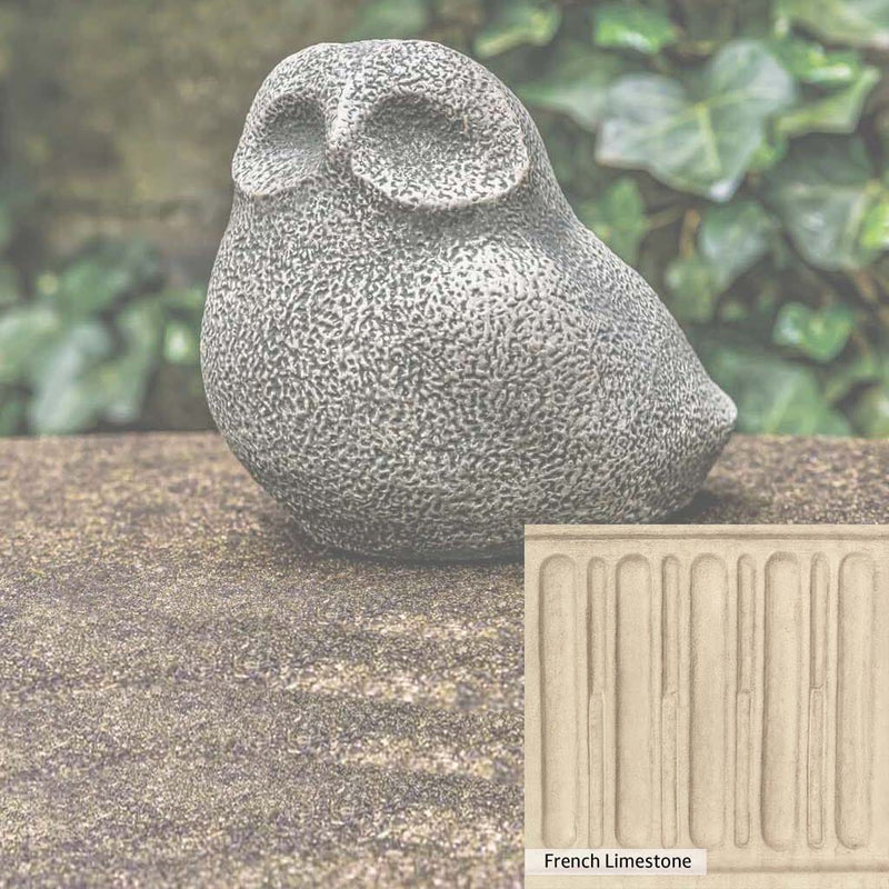 French Limestone Patina for the Campania International Stone Owl Statue, old-world creamy white with ivory undertones.