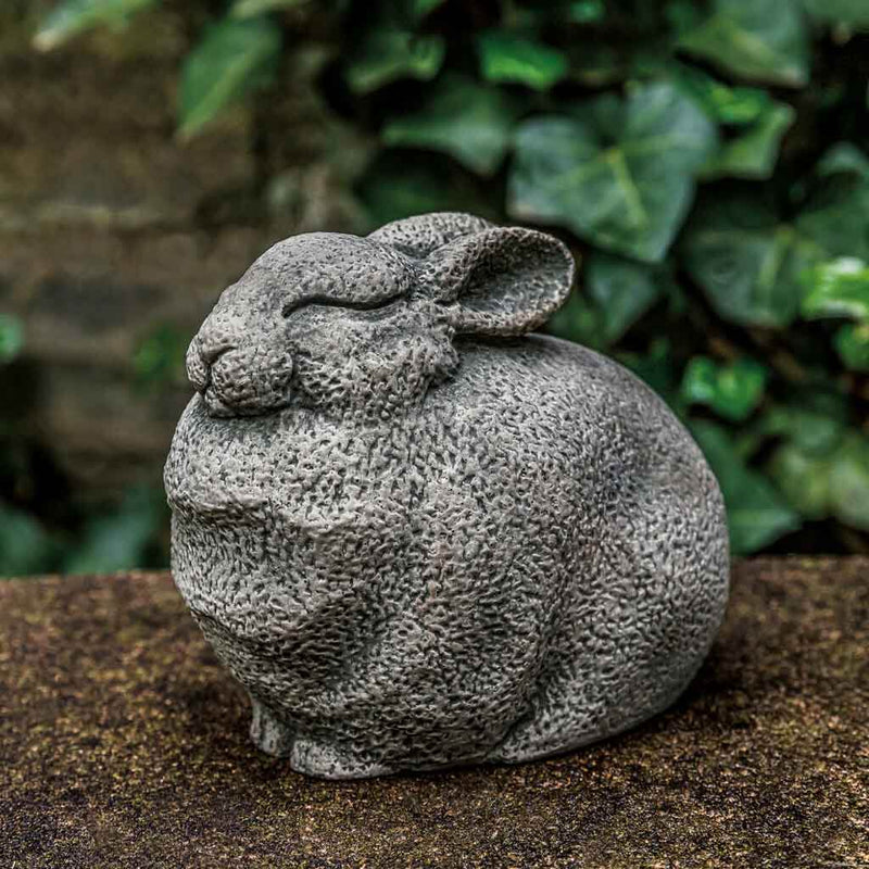 Campania International Stone Bunny Statue stained in the Greystone patina, the ideal color for this garden statue.