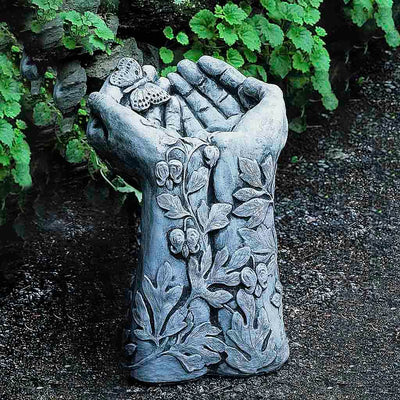 Campania International Mariposa Birdbath, shown in the Alpine Stone color, highlighting and enriching the details of the cast stone.
