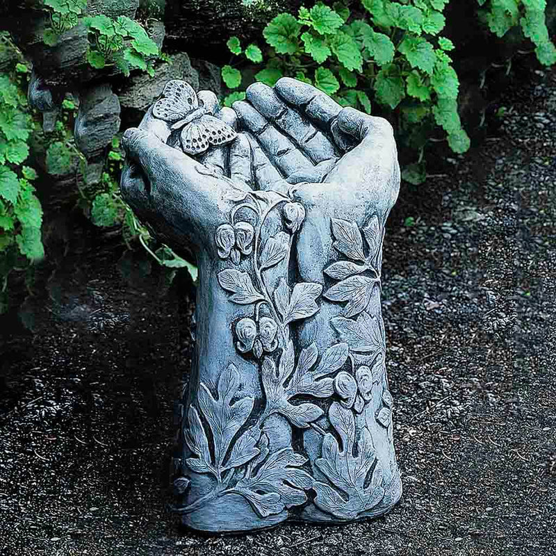 Campania International Mariposa Birdbath, shown in the Alpine Stone color, highlighting and enriching the details of the cast stone.