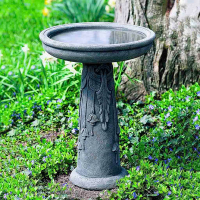 Campania International Flores Birdbath, shown in the Alpine Stone color, highlighting and enriching the details of the cast stone.