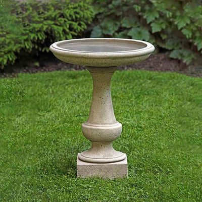 Campania International Chatham Birdbath, shown in the Alpine Stone color, highlighting and enriching the details of the cast stone.
