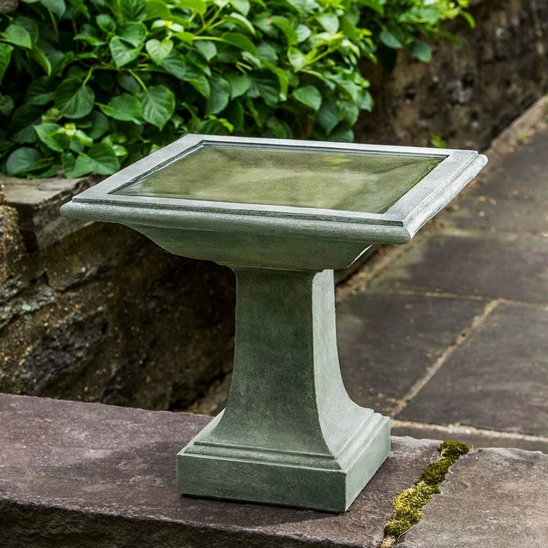 Campania International Avery Birdbath, shown in hand-painted Verde, a light green-gray patina that works well against multiple colors in the landscape.