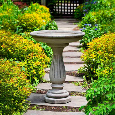 Campania International Wyndmoor Birdbath, shown in hand-painted Verde, a light green-gray patina that works well against multiple colors in the landscape.
