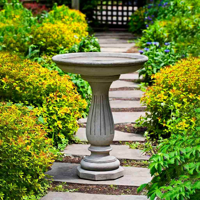 Campania International Wyndmoor Birdbath, shown in hand-painted Verde, a light green-gray patina that works well against multiple colors in the landscape.