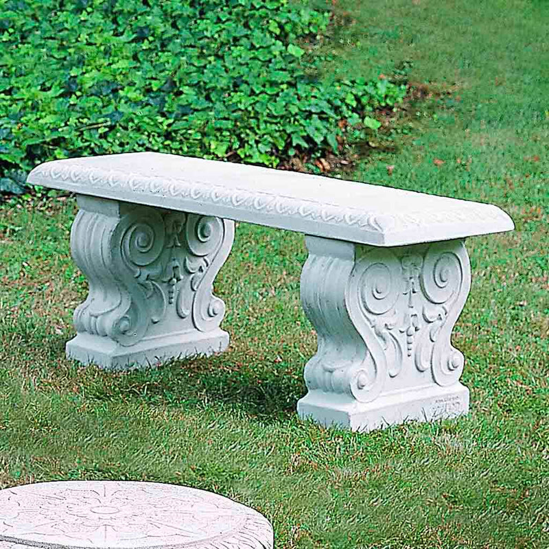 Campania International Traditional Straight Bench, set in the garden to adding charm and purpose. The bench is shown in the Natural Patina.