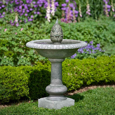 Campania International Williamsburg Pineapple Fountain is made of cast stone by Campania International and shown in the Alpine Stone Patina