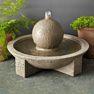 Campania International M-Series Sphere Fountain, adding interest to the garden with the sound of water. This fountain is shown in the Alpine Stone Patina.
