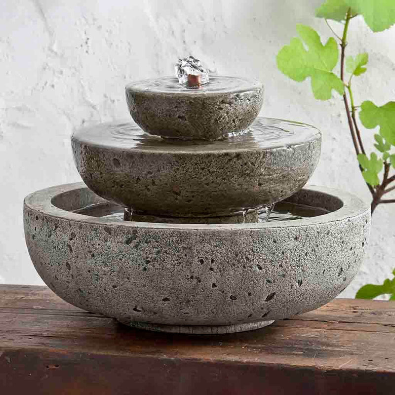 Campania International M-Series Platia Fountain, adding interest to the garden with the sound of water. This fountain is shown in the Alpine Stone Patina.