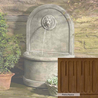 Pietra Nuova Patina for the Campania International Lion Wall Fountain, a rich brown blended with black and orange.