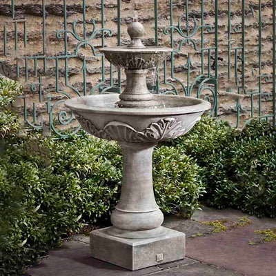 Campania International Acanthus Two Tiered Fountain, adding interest to the garden with the sound of water. This fountain is shown in the Alpine Stone Patina.