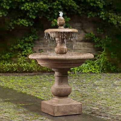 Campania International Caterina Two Tiered Fountain, adding interest to the garden with the sound of water. This fountain is shown in the Brownstone Patina.