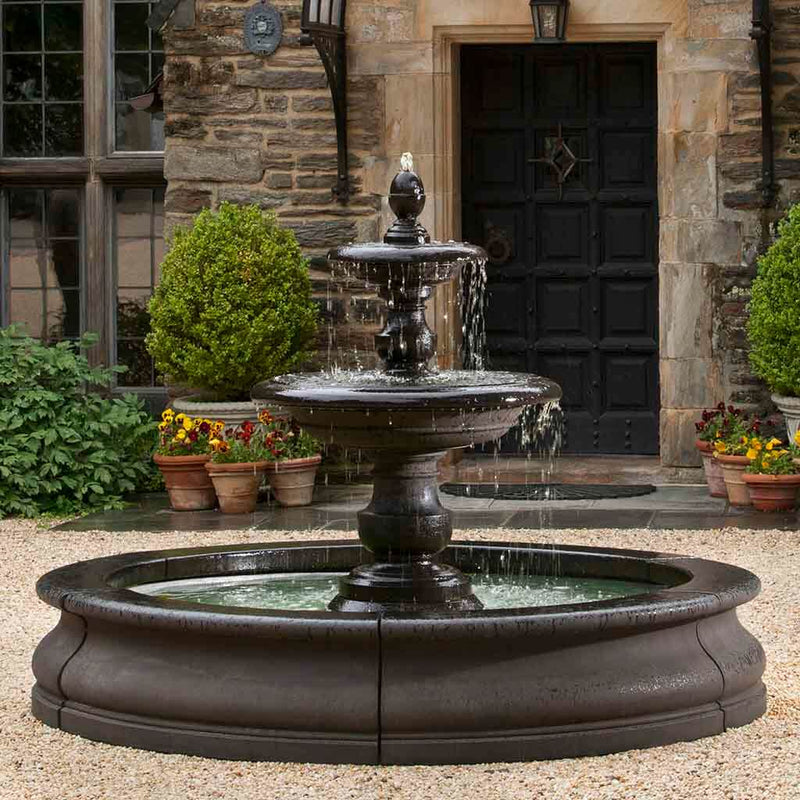 Campania International Caterina Fountain in Basin, adding interest to the garden with the sound of water. This fountain is shown in the Nero Nuovo Patina.