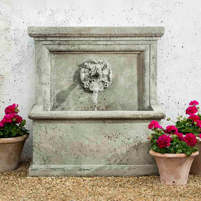 Campania International St. Aubin Fountain, adding interest to the garden with the sound of water. This fountain is shown in the Alpine Stone Patina.