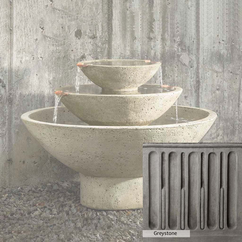 Greystone Patina for the Campania International Carrera Oval Fountain, a classic gray, soft, and muted, blends nicely in the garden.