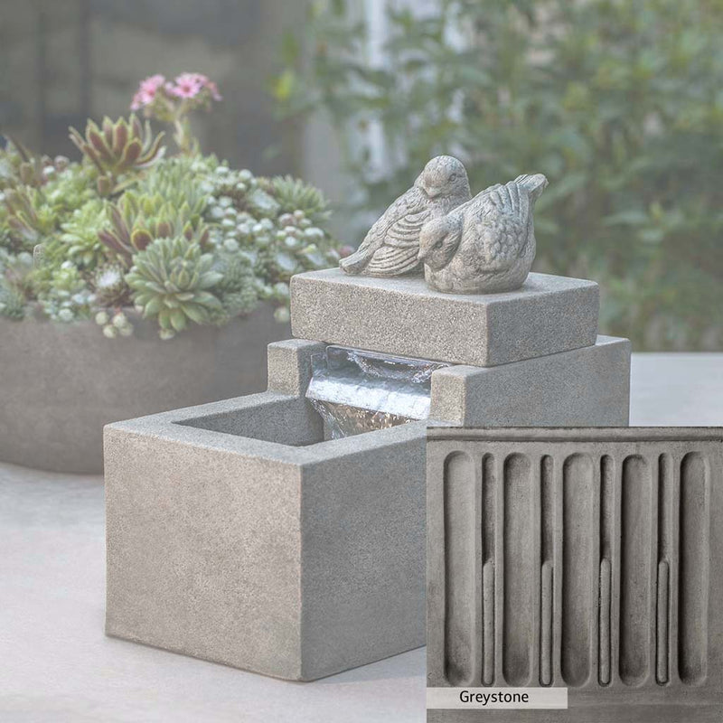 Greystone Patina for the Campania International Mini Element Bird Fountain, a classic gray, soft, and muted, blends nicely in the garden.