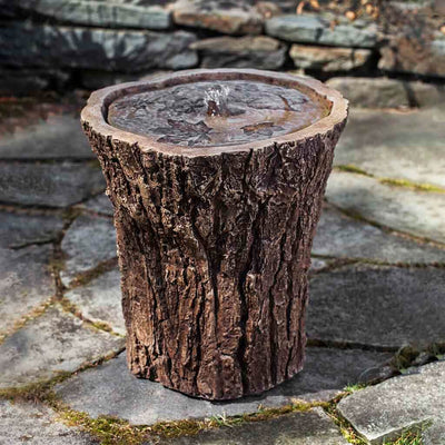 Campania International Adirondack Fountain is made of cast stone by Campania International and shown in the Brownstone Patina