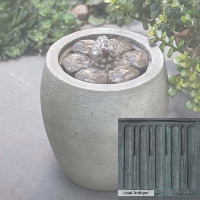 Lead Antique Patina for the Campania International M-Series Camellia Fountain, deep blues and greens blended with grays for an old-world garden.