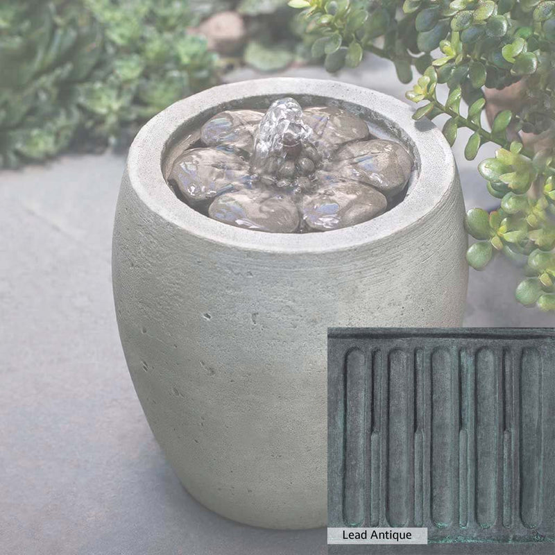 Lead Antique Patina for the Campania International M-Series Camellia Fountain, deep blues and greens blended with grays for an old-world garden.