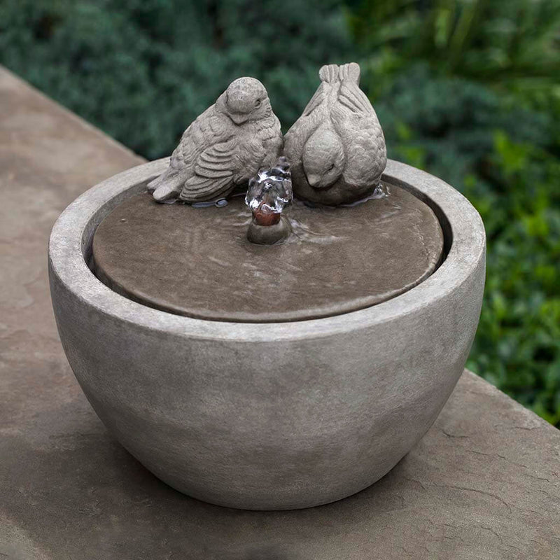 Campania International M-Series Bird Fountain, adding interest to the garden with the sound of water. This fountain is shown in the Alpine Stone Patina.