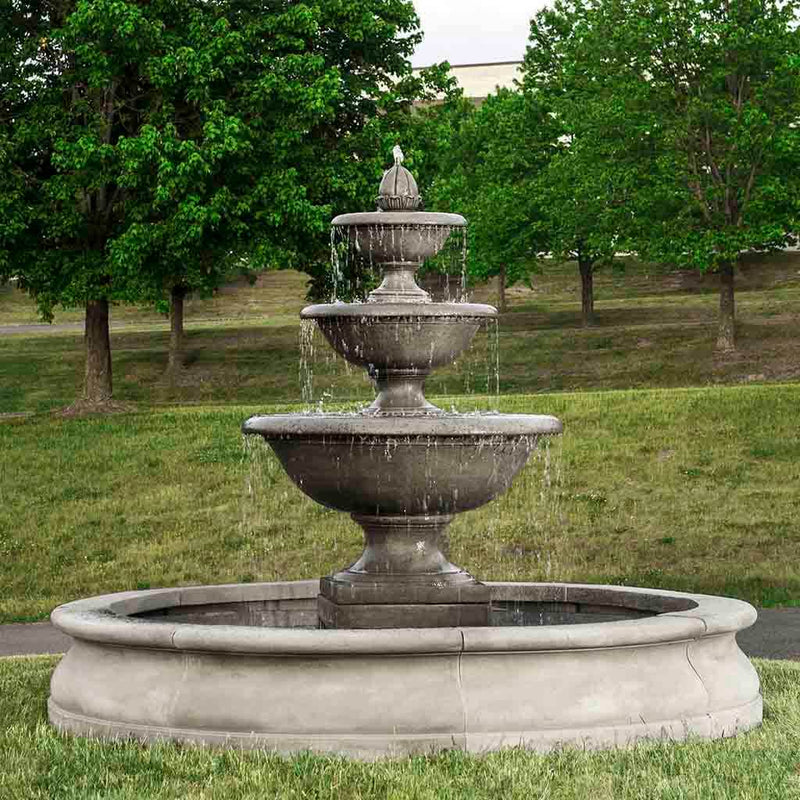 Campania International Monteros Fountain in Basin, adding interest to the garden with the sound of water. This fountain is shown in the Alpine Stone Patina.