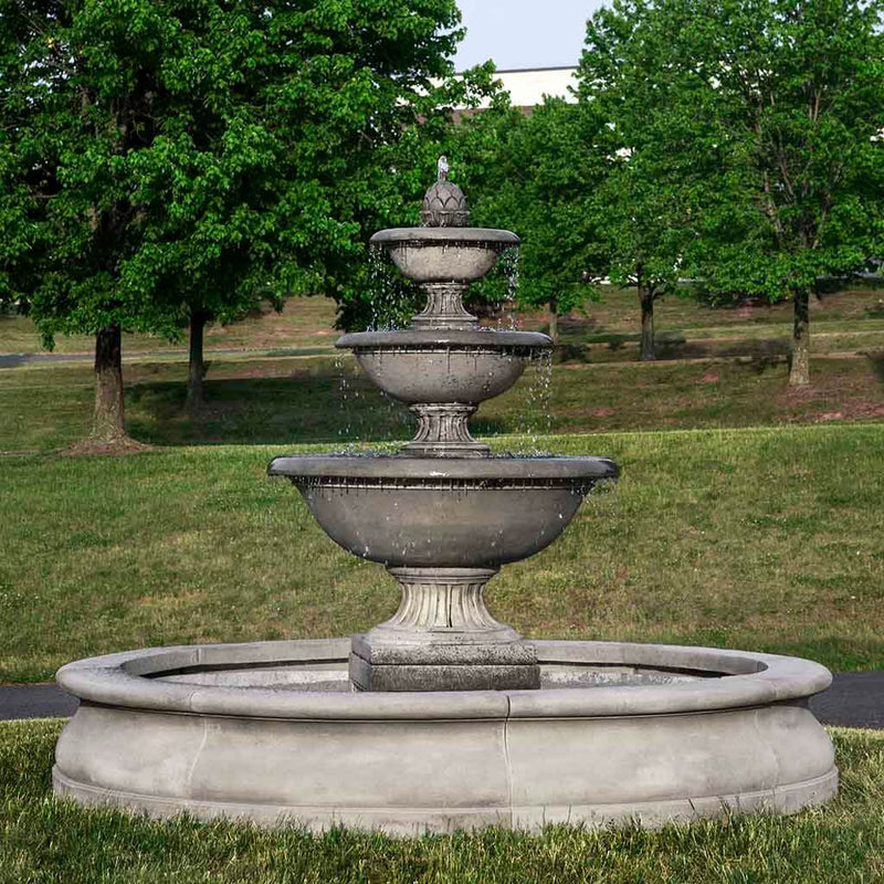 Campania International Fonthill Fountain in Basin, adding interest to the garden with the sound of water. This fountain is shown in the Alpine Stone Patina.