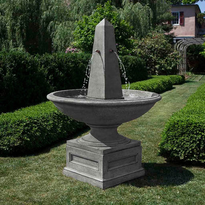 Campania International Condotti Obelisk Fountain is made of cast stone by Campania International and shown in the Alpine Stone