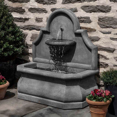 Campania International Segovia Fountain is made of cast stone and shown in in the Alpine Stone Patina., adding interest to the garden with the sound of water. This fountain is