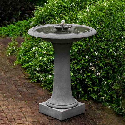 Campania International Camellia Birdbath Fountain is made of cast stone by Campania International and shown in the Alpine Stone Patina