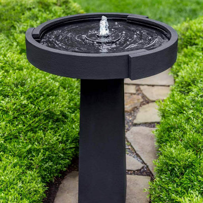 Campania International Concept Birdbath Fountain is made of cast stone by Campania International and shown in the Nero Nuovo Patina
