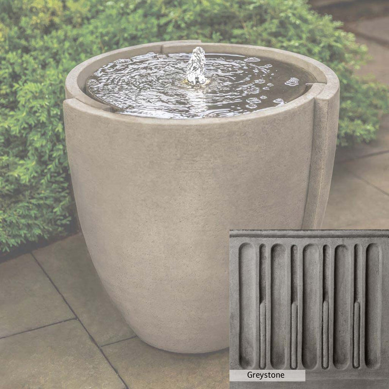 Greystone Patina for the Campania International Concept Basin Fountain, a classic gray, soft, and muted, blends nicely in the garden.