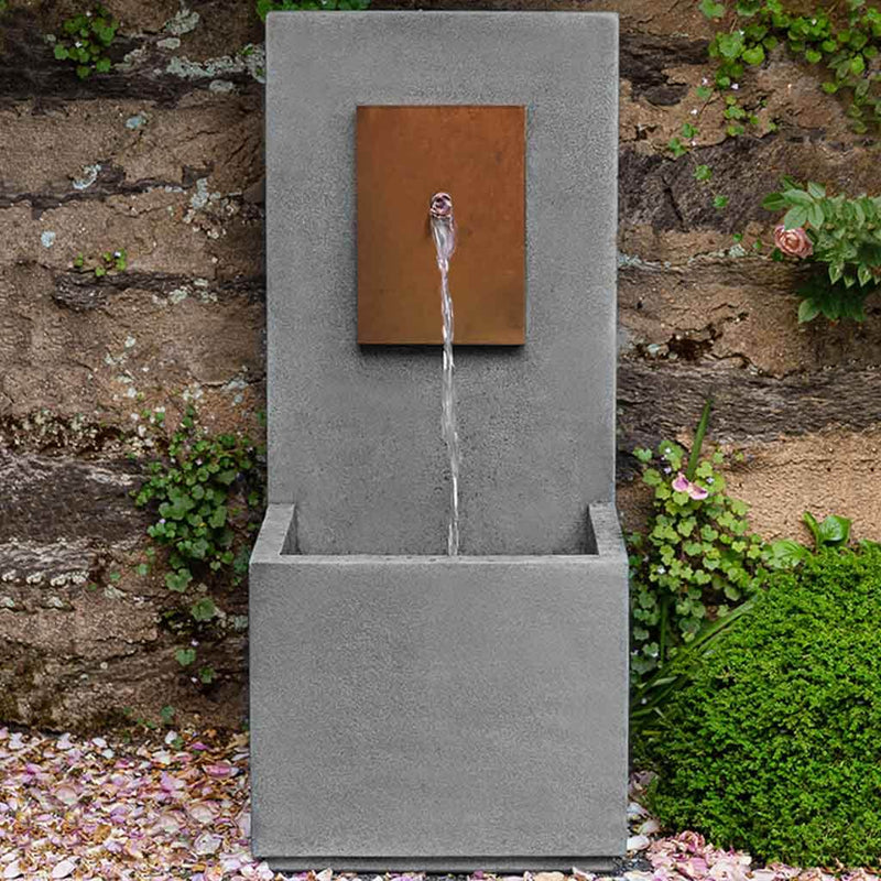 Campania International MC 4 Fountain with Corten Face, adding interest to the garden with the sound of water. This fountain is shown in the Alpine Stone Patina.
