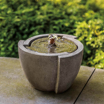 Campania International M-Series Concept Fountain, adding interest to the garden with the sound of water. This fountain is shown in the Greystone Patina.