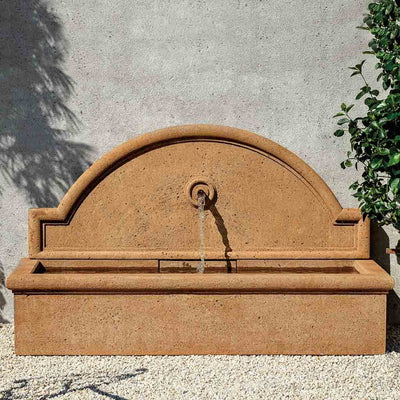 Campania International Aranjuez Fountain, adding interest to the garden with the sound of water. This fountain is shown in the Travertine Patina.