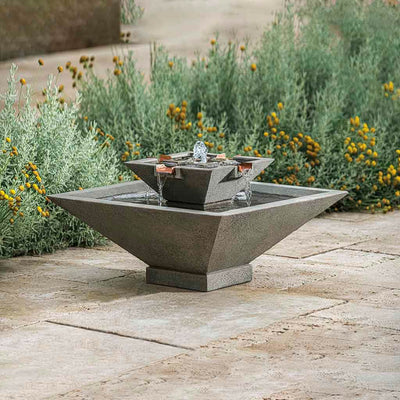 Campania International Facet Small Fountain, adding interest to the garden with the sound of water. This fountain is shown in the Alpine Stone Patina.