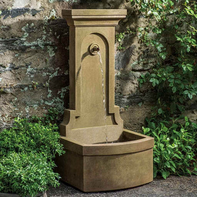 Campania International Loggia Fountain, adding interest to the garden with the sound of water. This fountain is shown in the Aged Limestone Patina.